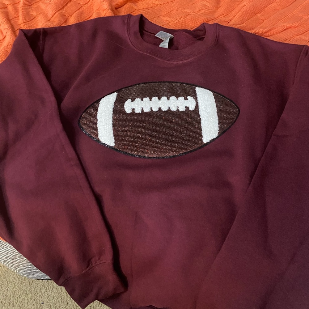New Custom made bling football sweatshirt, size medium.